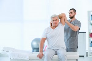 Shoulder Pain Treatment Saskatoon | physiotherapist treating patient for shoulder pain